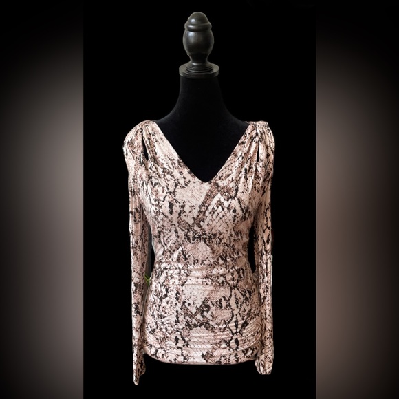 Jennifer Lopez: Brown and White Animal Print Cold Shoulder Blouse - Picture 12 of 17